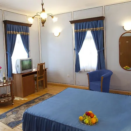 бела